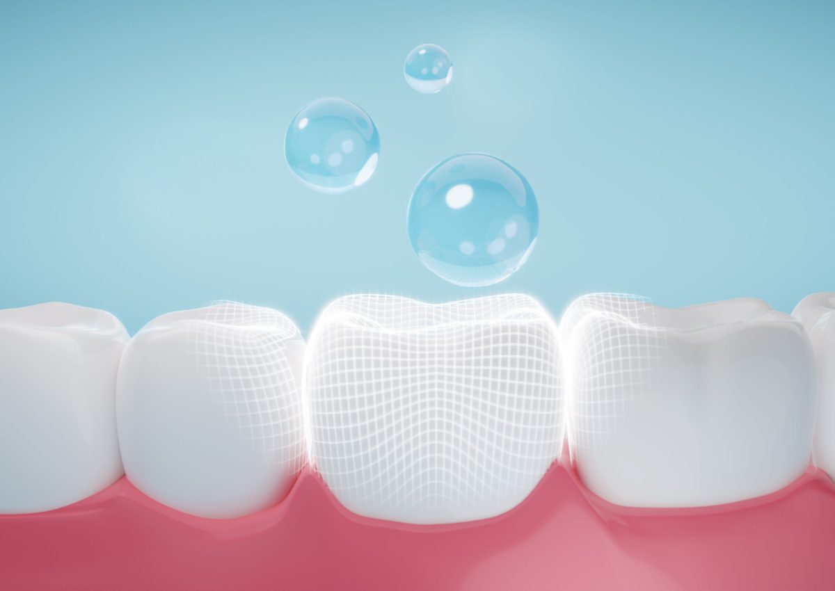 Drop of fluoride coating teeth and gums metaphor oral hygiene, cleaning teeth and gums. 3D rendering.